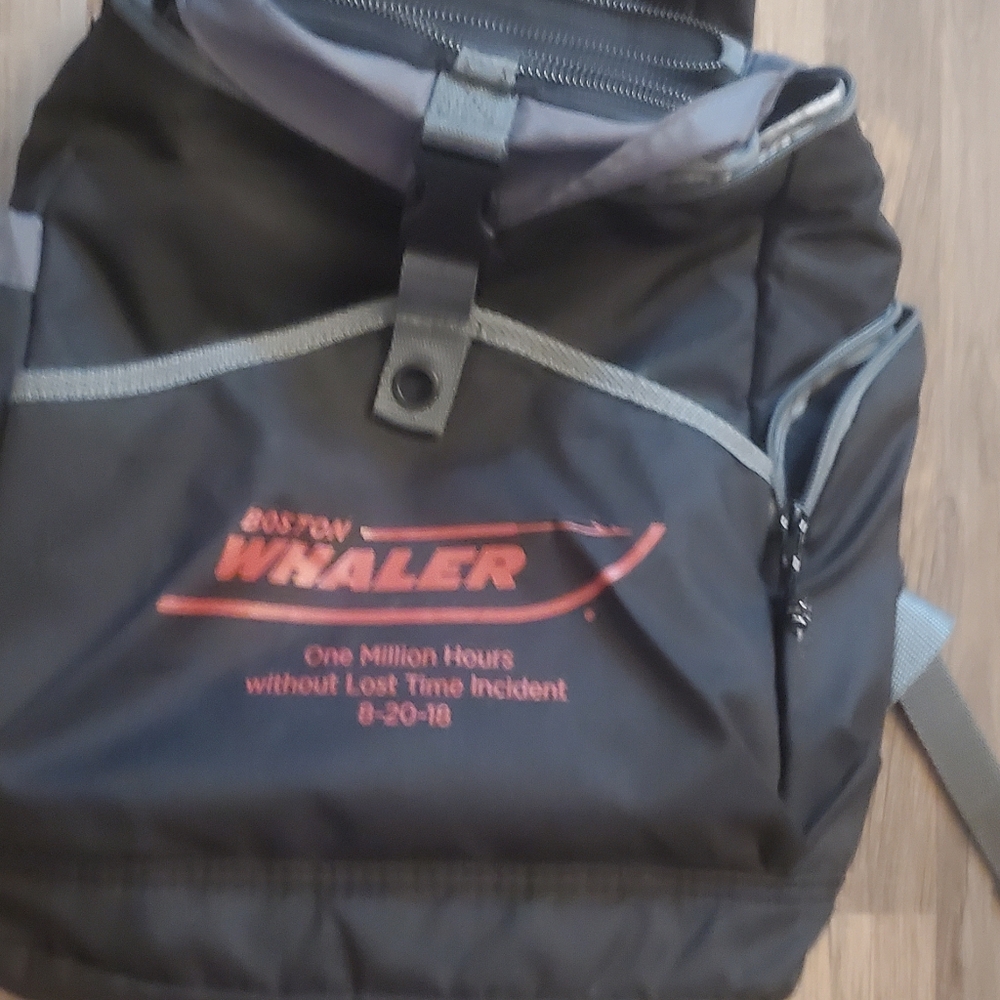 Boston whaler cooler backpack in black and red